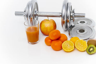 High angle view of fruits in jar on table