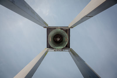 Low angle view of metallic structure against sky