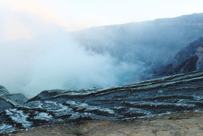 Smoke emitting from volcanic mountain