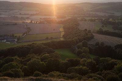 Scenic view of landscape against sky during sunset