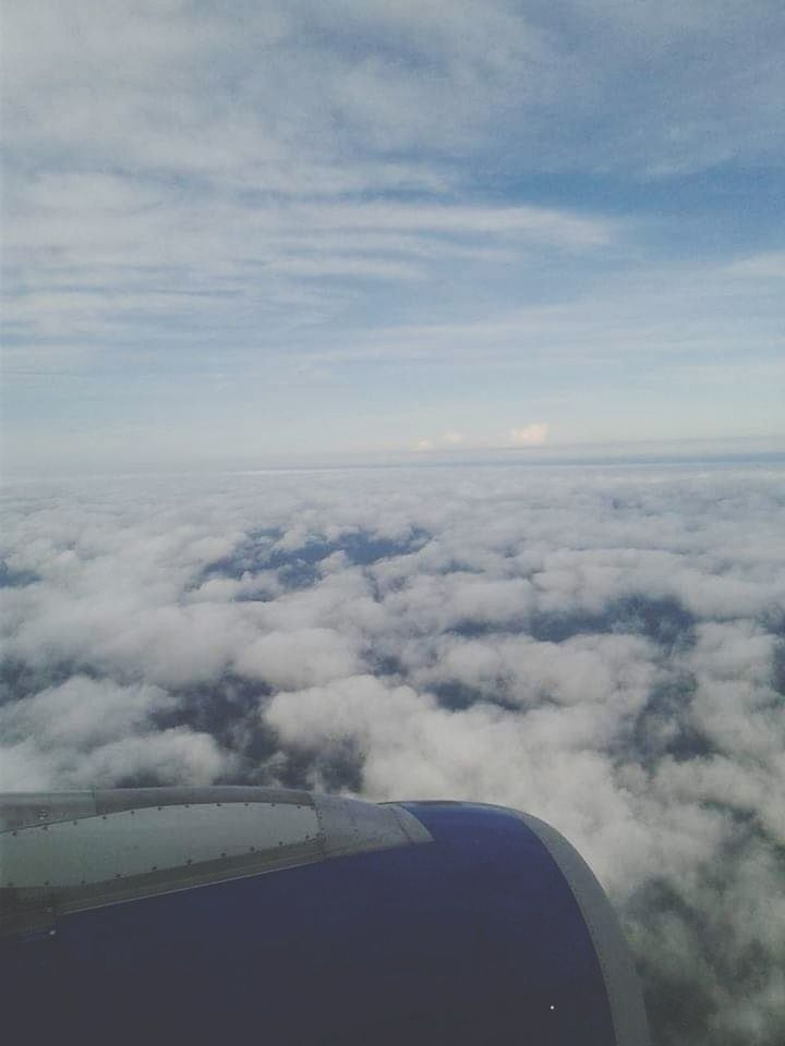 cloud - sky, air vehicle, airplane, sky, mode of transportation, beauty in nature, transportation, flying, no people, scenics - nature, aerial view, jet engine, nature, day, travel, cloudscape, engine, outdoors, mid-air, environment