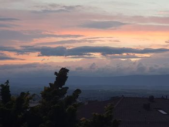 High angle view of trees against sky during sunset