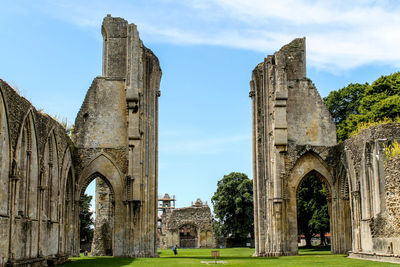 Low angle view of old ruins against sky