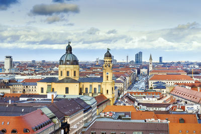 High angle view of buildings in city against sky