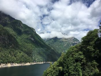 Scenic view of tree mountains against sky