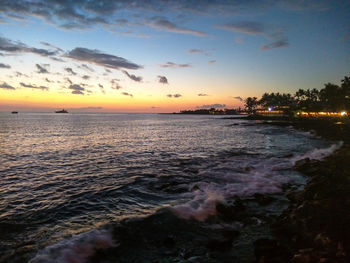 Scenic view of sea at sunset