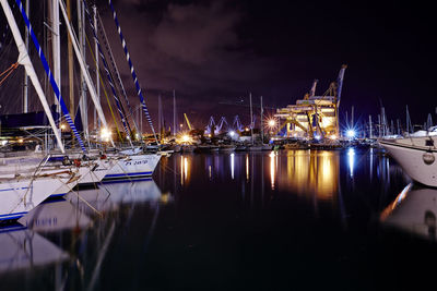 Boats moored at harbor