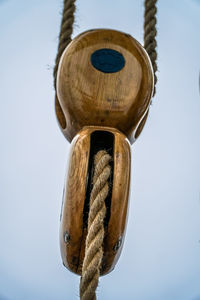 Low angle view of hanging against sky