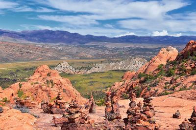 Scenic view of landscape and mountains against sky