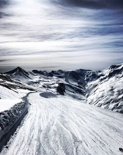 Scenic view of landscape against sky during winter