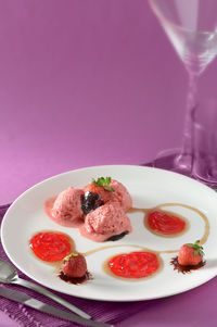 Close-up of strawberries served on table