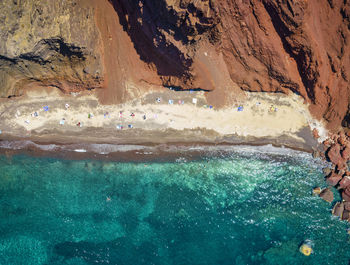 People swimming in sea