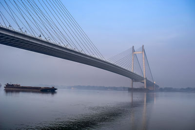 View of suspension bridge over river