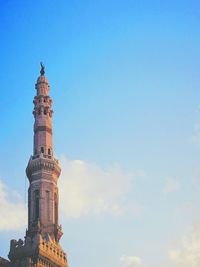 Low angle view of bell tower against sky