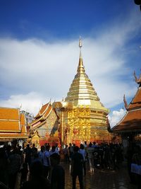 Group of people in temple against building