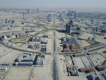 Aerial view of townscape against sky