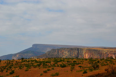 View of landscape against cloudy sky