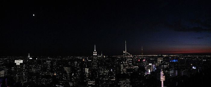 Illuminated cityscape at night