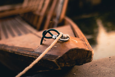 Close-up of abandoned shoes on wood