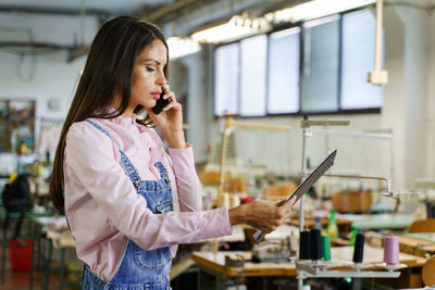 Young woman using mobile phone