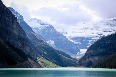 Scenic view of mountains and lake against sky