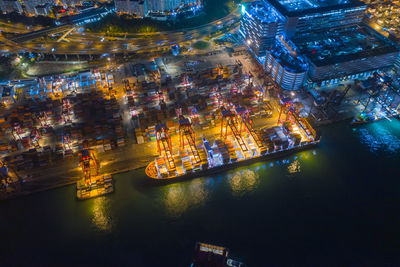 High angle view of illuminated city at night