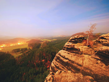 Scenic view of landscape against sky during sunset