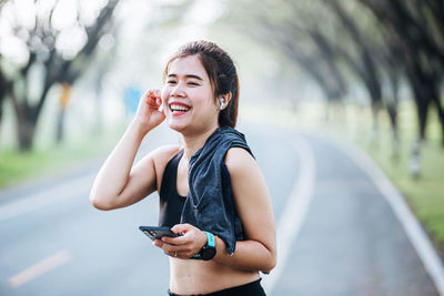 Young woman using mobile phone