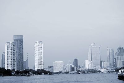 Modern cityscape against clear sky