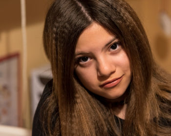 Close-up portrait of a smiling young woman