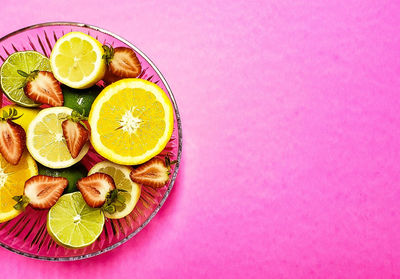 High angle view of fruits in plate on table