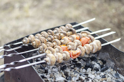 High angle view of meat on barbecue