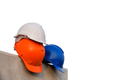 Close-up of hat against white background