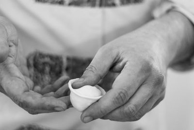 Close-up of man holding ice cream