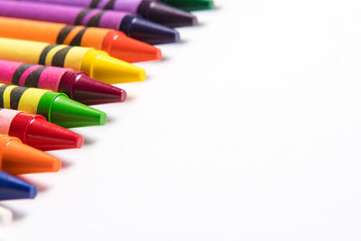 Close-up of colored pencils on table