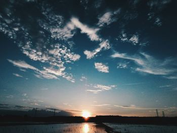 Scenic view of sunset over river