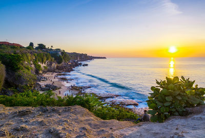 Scenic view of sea against sky during sunset