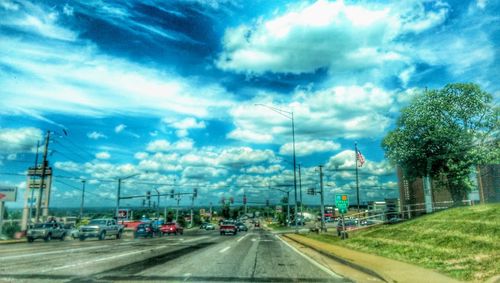 View of road against cloudy sky