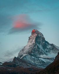 Scenic view of snowcapped mountain against sky