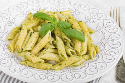 High angle view of pasta in plate on table