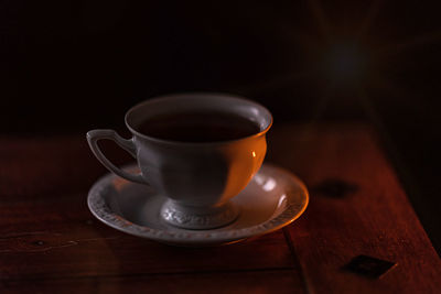 Close-up of coffee cup on table