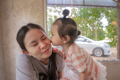 Mother and daughter in park