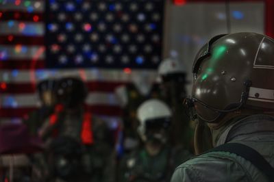 View of air forces pilot against american flag