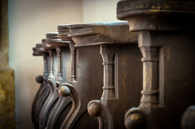 Close-up of benches in church