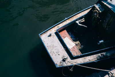 High angle view of abandoned boat moored on pier