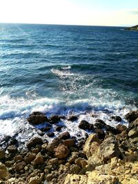 Scenic view of sea against clear sky