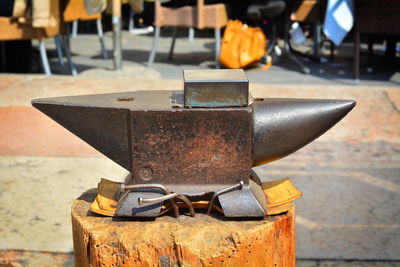 Close-up of old machine on table