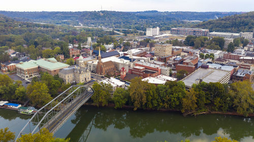 High angle view of river amidst buildings in town