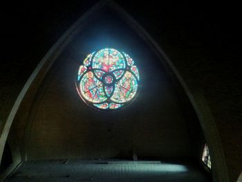 Low angle view of illuminated ceiling