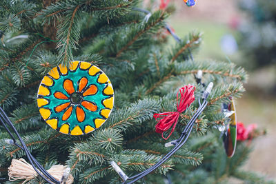 Handmade eco friendly decoration made of old cd or dvd discs on a christmas tree. diy ideas. recycle